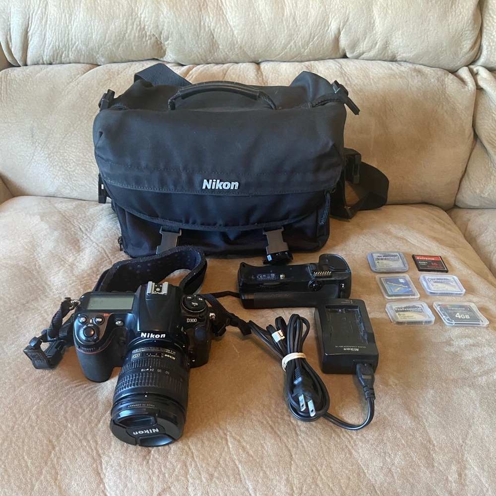 Nikon D300 with AF-S Nikkor 18-70mm lens and accessories.